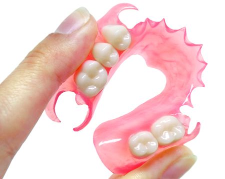 Nên hay không nên làm răng sứ tháo lắp trồng răng implant tại quận 10 uy  tín chất lượng